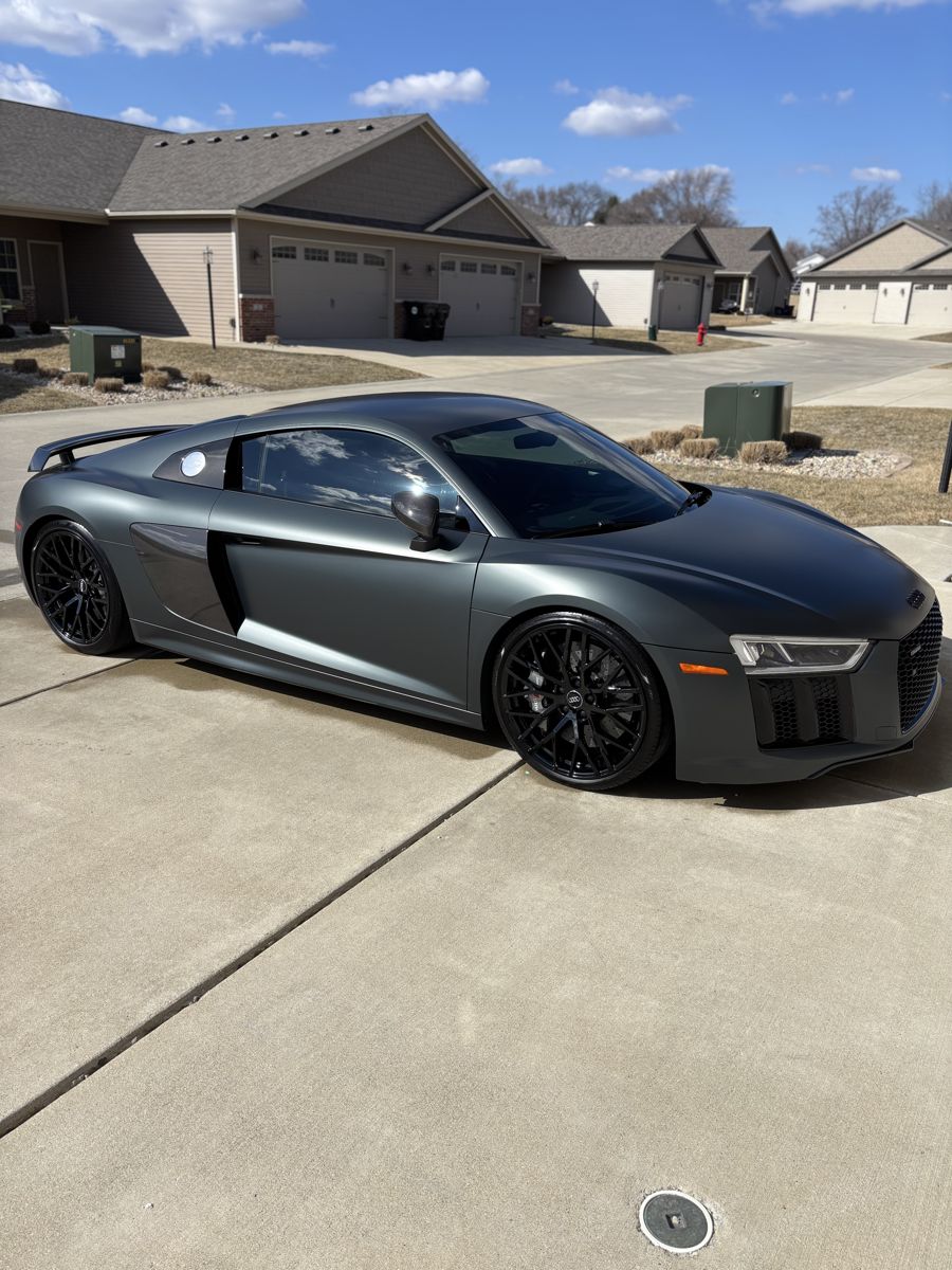 Freshly detailed matte gray Audi R8 in a driveway